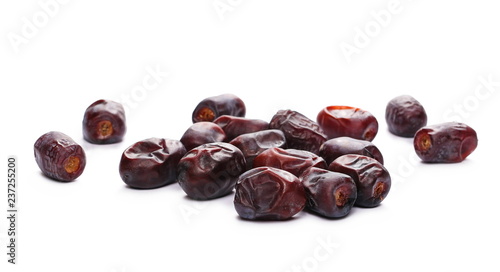 Pile dry dates isolated on white background, sweet fruit