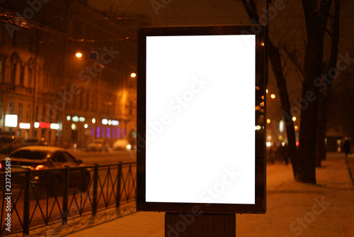 city outdoor billboard mockup Glows in the darkness of the night city winter.