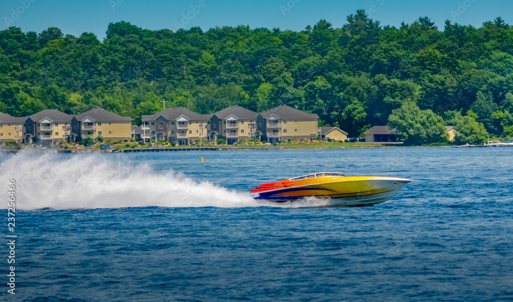 Fototapeta premium Colorful speedboat on water