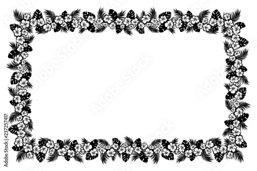 Palm leaves and tropical flowers. Black silhouette frame