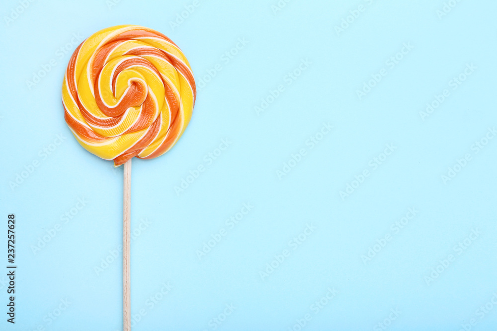 Colorful lollipop on blue background Colorful lollipop on blue background