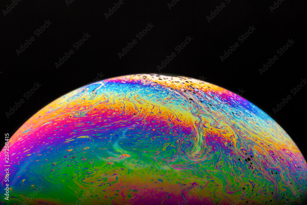 Macrophotograph of a colorful soap bubble Macrophotograph of a colorful soap bubble