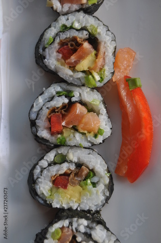 Sushi. Delicious meal with fish, rice and supplements, prepared at home.