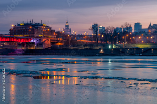 Warsaw, Poland. Iluminated bridge over Vistula river 