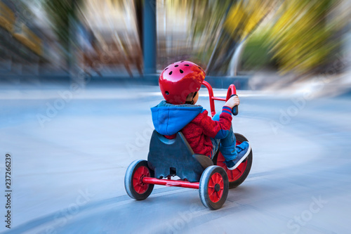 boy on tricycle photo