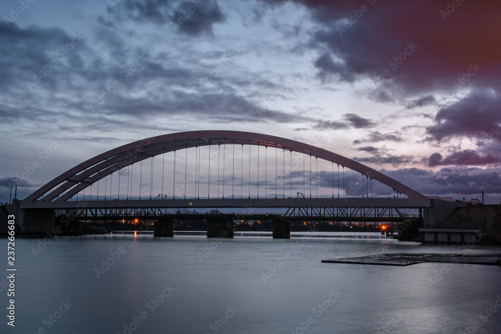 Railway bridge over Martwa Wisla river at dusk in Gdansk. Poland Europe. Railway bridge over Martwa Wisla river at dusk in Gdansk. Poland Europe.