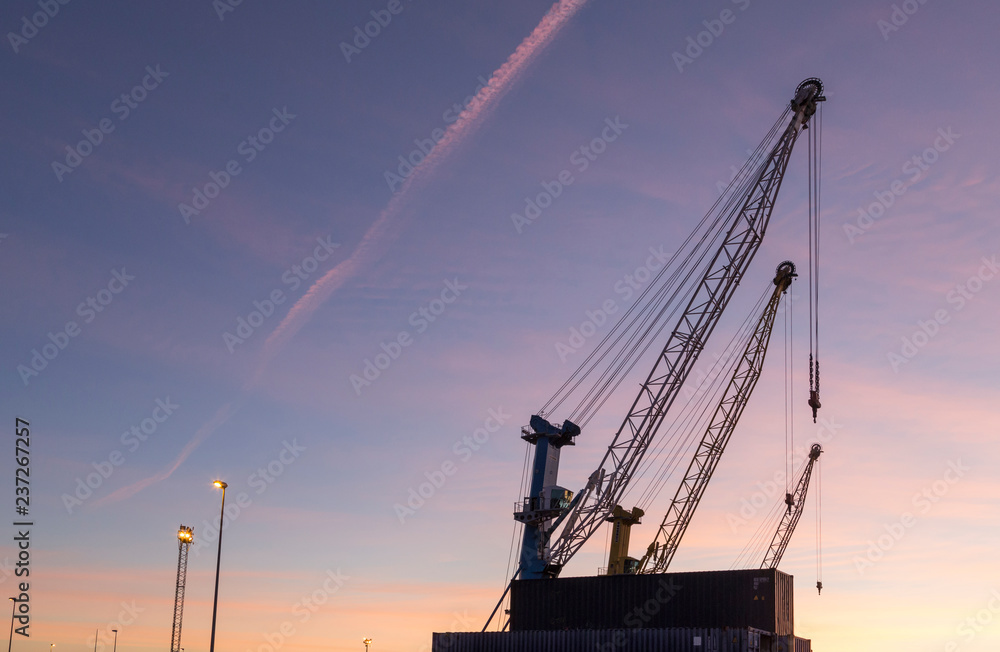 sunrise in the port of Sagunto, cranes