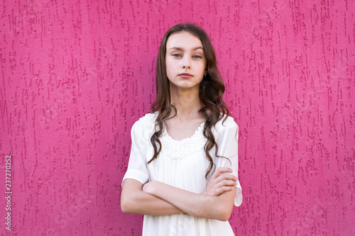 Beautiful girl with crossed arms