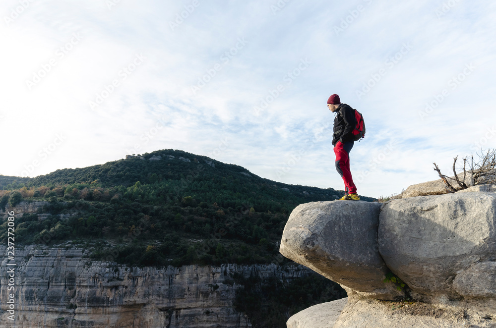 young man on a rock