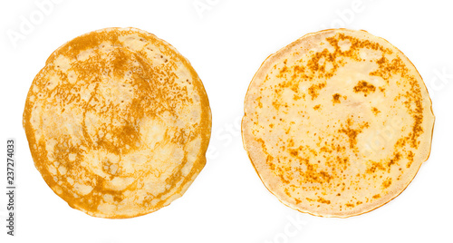 homemade russian pancake isolated on white background, close-up, top view