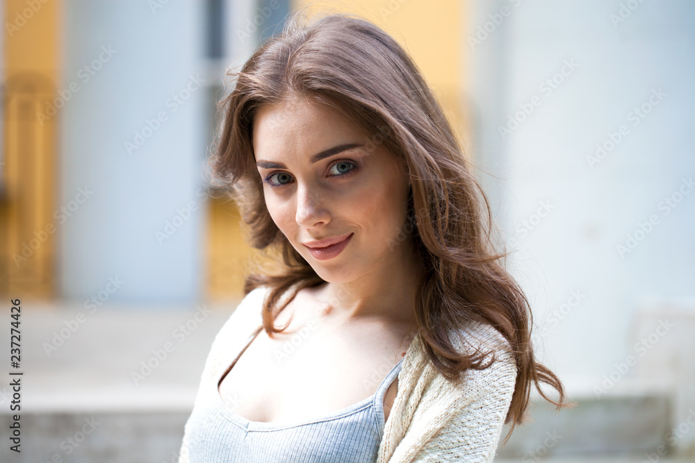 Closeup portrait of a young beautiful girl on summer background Closeup portrait of a young beautiful girl on summer background