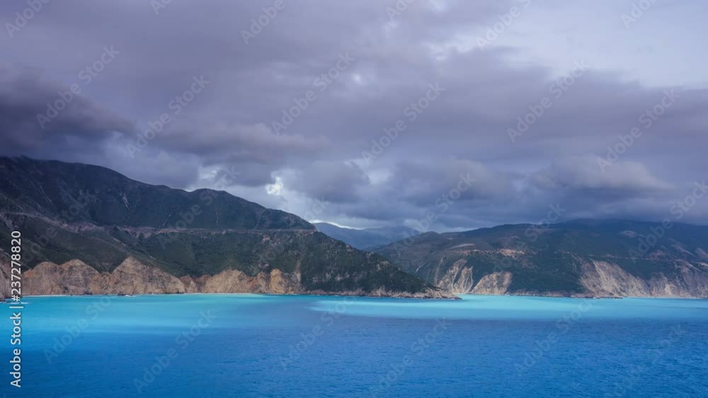 4k timelapse of magic light and clouds crossing the sky over the sea and rocky shore. Sunrise or sunset evening time on Kefalonia island, Greece Calmness, meditation and relax concept 4k timelapse of magic light and clouds crossing the sky over the sea and rocky shore. Sunrise or sunset evening time on Kefalonia island, Greece Calmness, meditation and relax concept