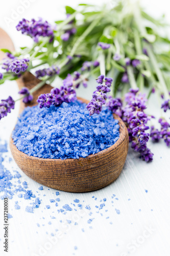 Essential lavender salt with flowers top view.