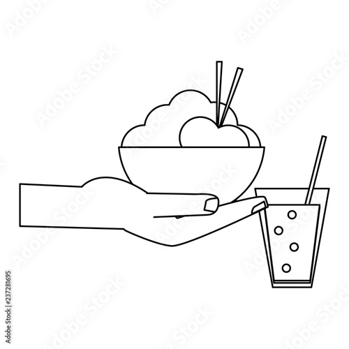 hand with ric bowl and soda cup black and white