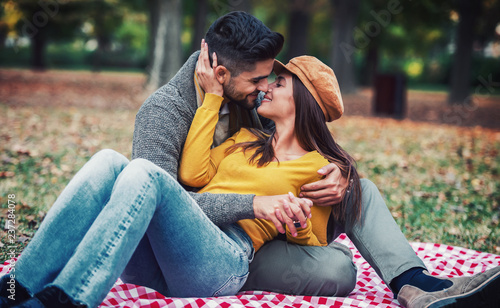 Loving couple in the park. Love, dating, romance © bobex73