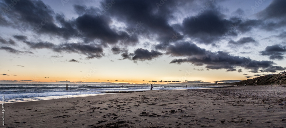 Panoramic beach landscape with dramatic sky