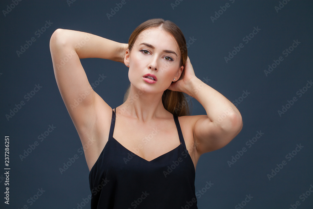 Beautiful blonde woman in black dress Beautiful blonde woman in black dress