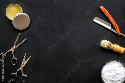 barbershop desk with tools for male care dark background top view mock-up