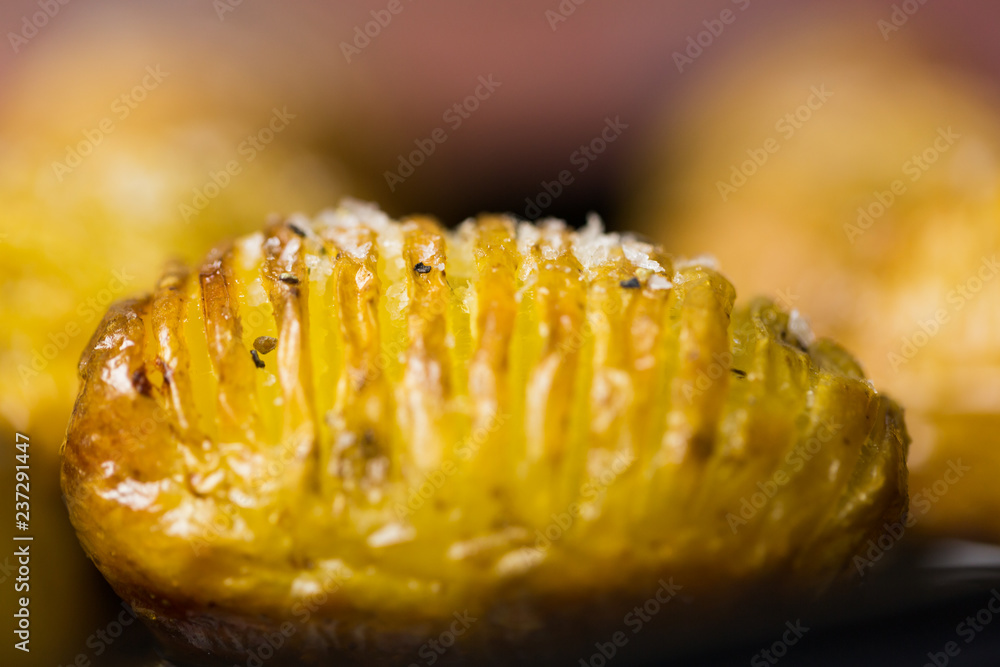 Close up of a Hasselback potato Close up of a Hasselback potato