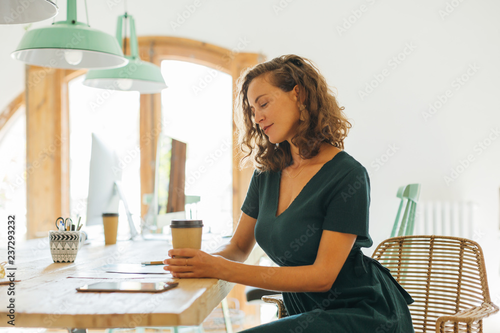 Young woman in a modern office. 