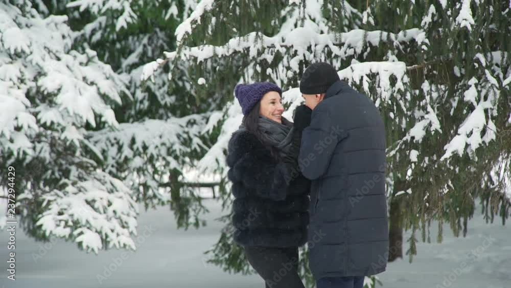 Man Warm Woman`s Hands in Winter Man Warm Woman`s Hands in Winter