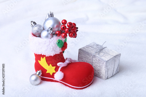 Wallpaper Mural Merry Christmas composition. Santa's shoe with gift boxes on billowy feathers with snow and snowflakes. Happy holidays. Torontodigital.ca