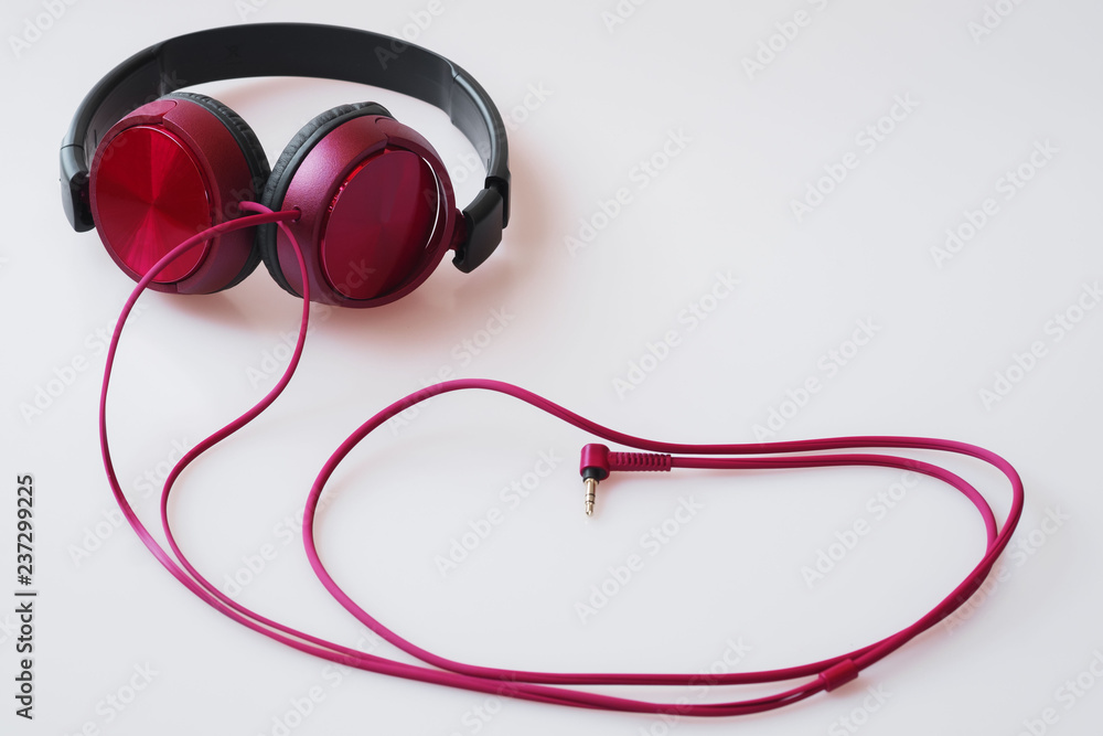 Flat lay of red headphone on white background with copy space Flat lay of red headphone on white background with copy space