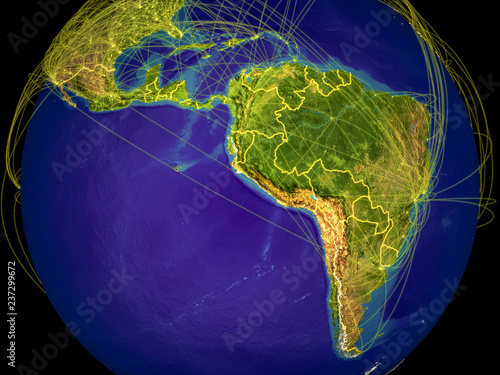 Latin America from space on Earth with country borders and lines representing international communication, travel, connections. photo