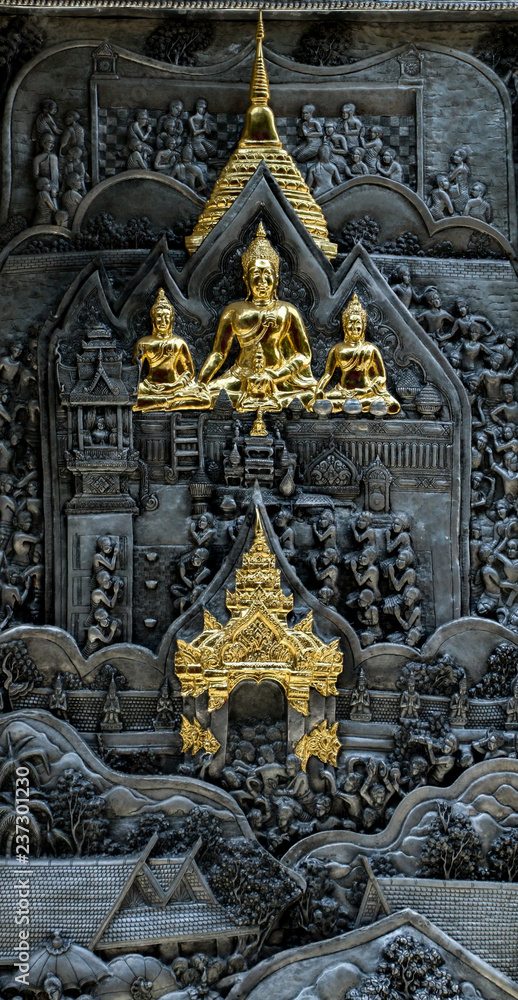 The silver pattern carve design on the wall temple at Chiang Mai Thailand. 