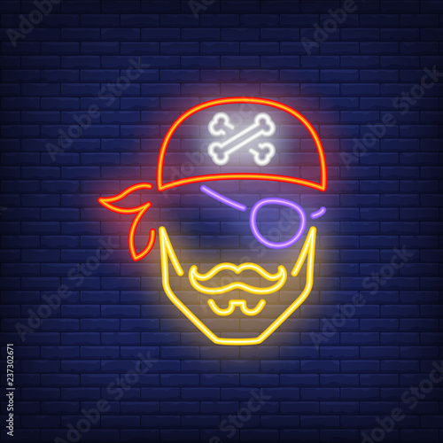 Pirate head in bandana and eye patch neon sign. Pirates, evil and warning design. Night bright neon sign, colorful billboard, light banner. Vector illustration in neon style.
