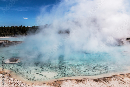 A beautiful and colorful hot spring in Yellowstone National Park in Wyoming photo