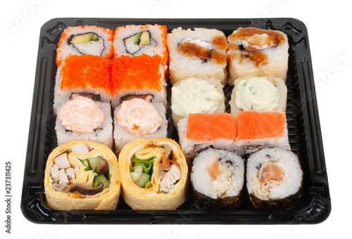 assorti sushi set in plastic box isolated on white background