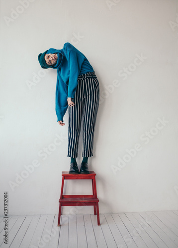 Fashionable woman posing on steps

