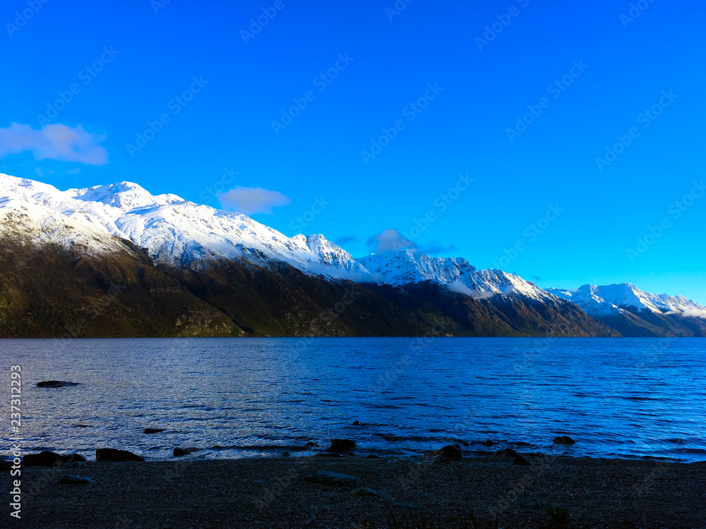 Lake Wakatipu near Queenstown in winter time with snow in New Zealand