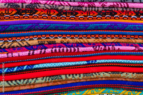 Colorful textile in a shop © ymgerman