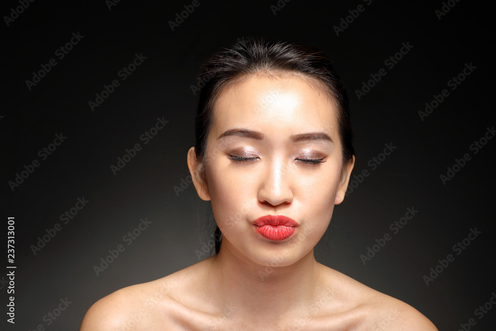 Young beautiful Asian woman facial expression Young beautiful Asian woman facial expression