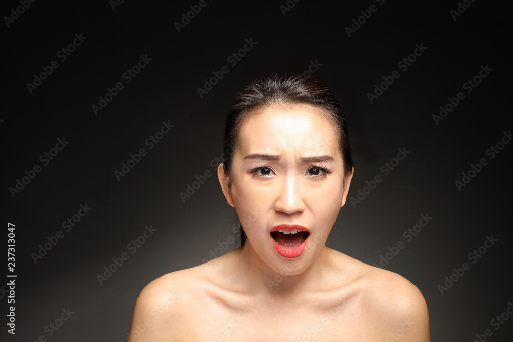 Young beautiful Asian woman facial expression Young beautiful Asian woman facial expression