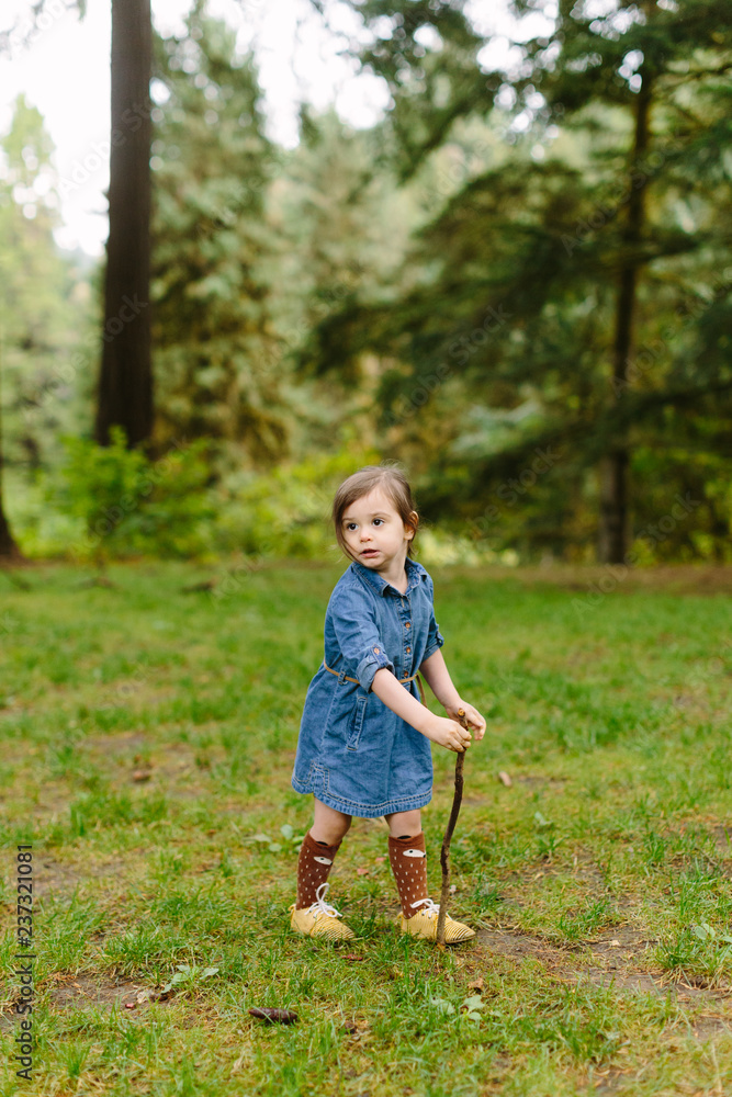 Adorable Little Girl Hiking in Forest Adorable Little Girl Hiking in Forest