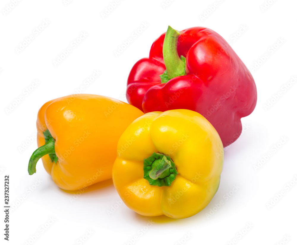 red and yellow peppers isolated on white background red and yellow peppers isolated on white background