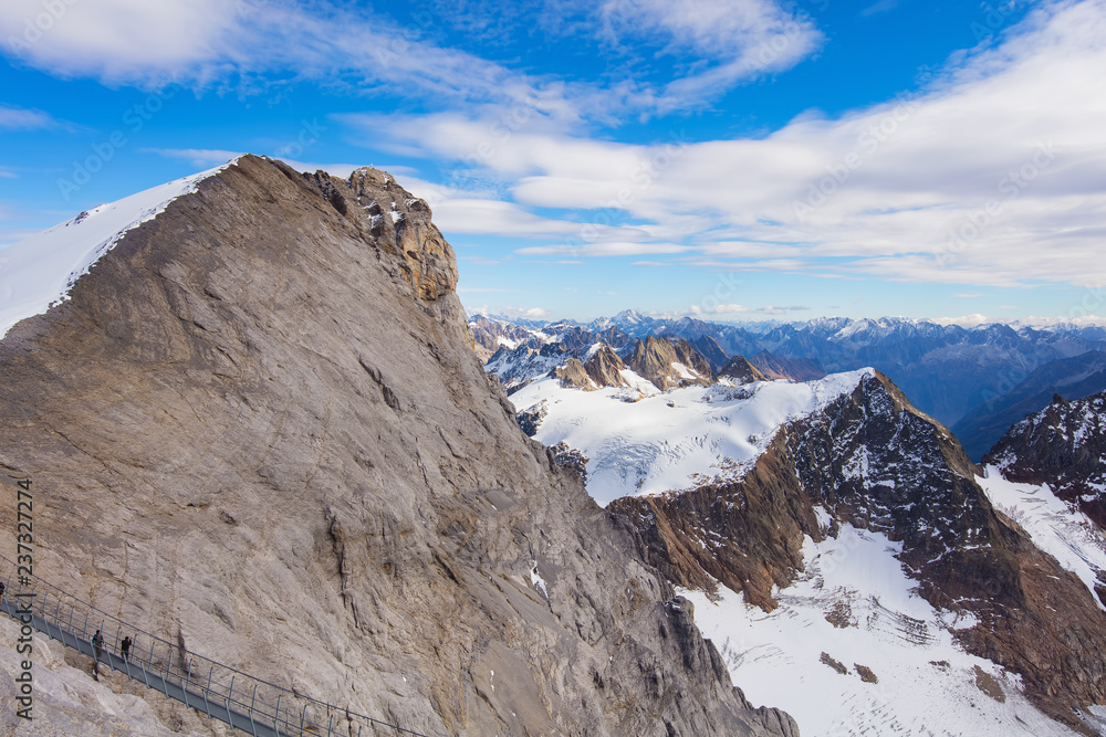 Obraz premium View from the top Mt. Titlis in Switzerland at the middle of October. The Titlis is a mountain, located on the border between the Swiss cantons of Obwalden and Bern.