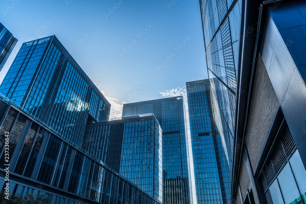 Modern office building against blue sky Modern office building against blue sky