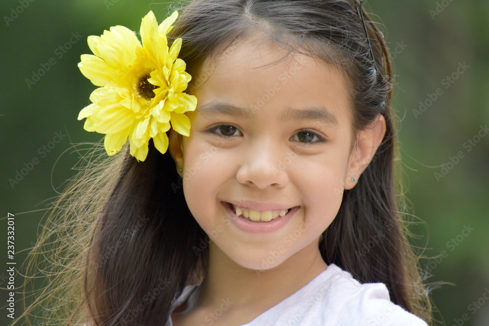Smiling Diverse Girl With A Flower Smiling Diverse Girl With A Flower