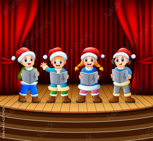 Cartoon children singing christmas carols on the stage