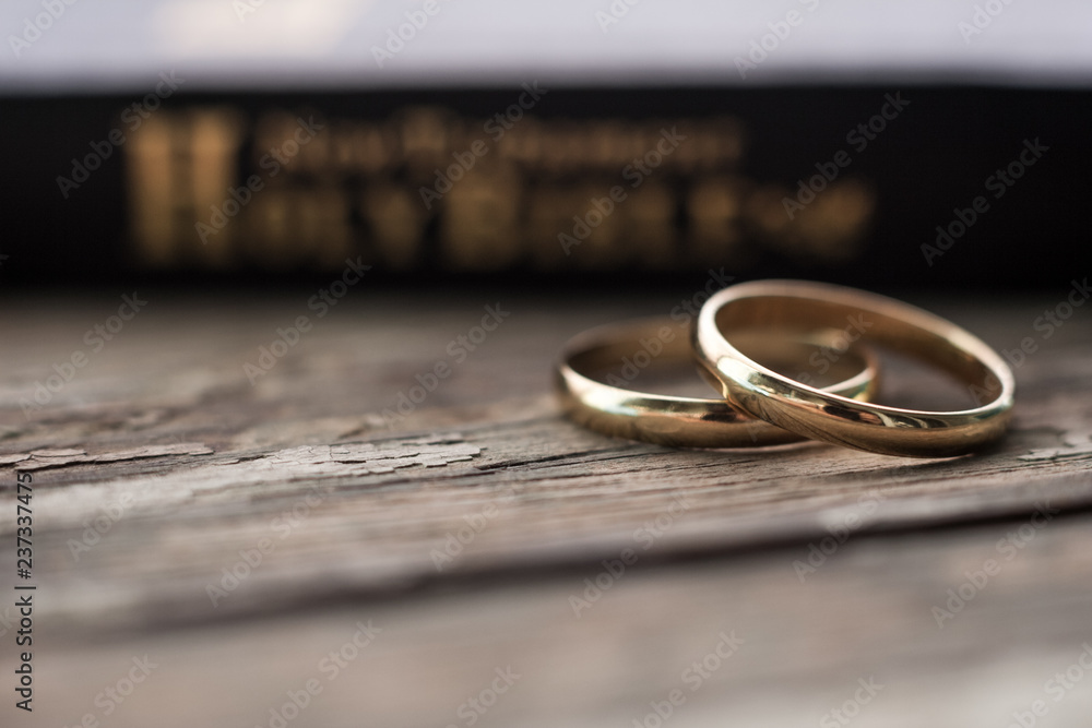 the bible is the base where upon two wedding rings rest the bible is the base where upon two wedding rings rest