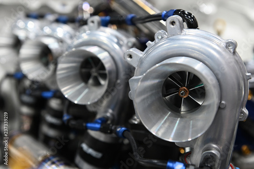 Photography Close up of Turbo charger installed on car engine for power booster torque drive