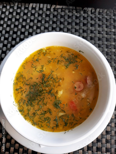 A plate of sausage soup