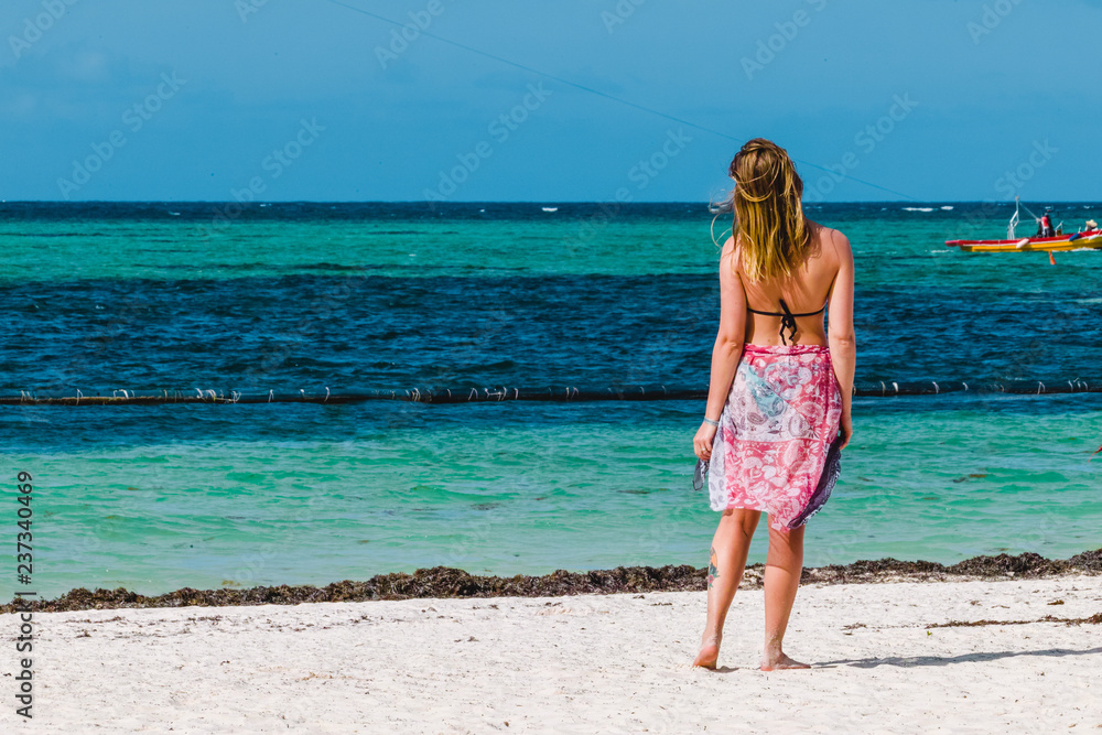 Girl at Bavaro Beaches in Punta Cana, Dominican Republic