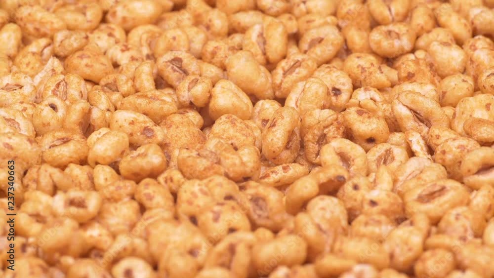 UHD closeup shot of the cereal snack on a rotating stand UHD closeup shot of the cereal snack on a rotating stand