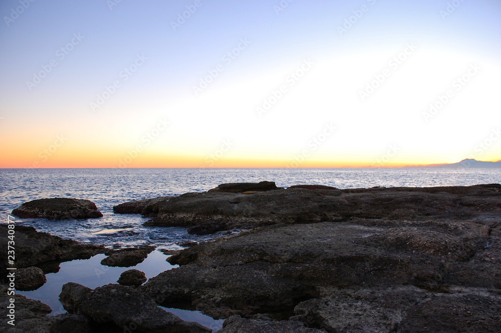 Obraz premium Sunset at sea port