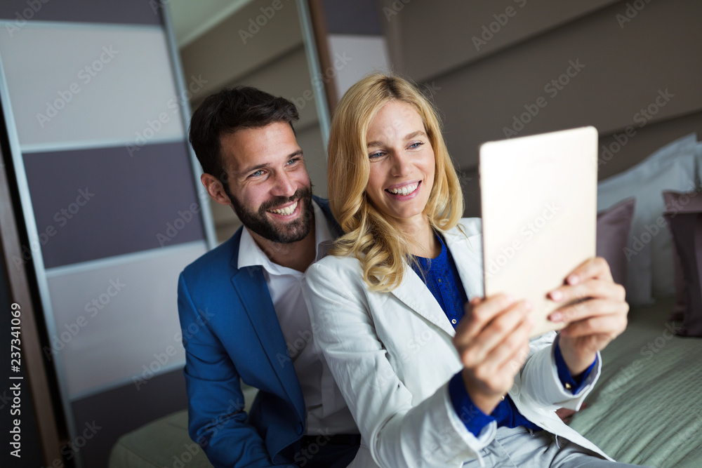 Businesspeople on business trip staying in hotel Businesspeople on business trip staying in hotel